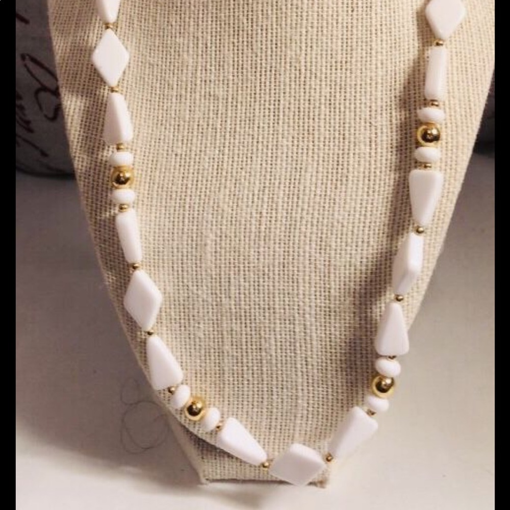 Trifari necklace in gold tone and cream color